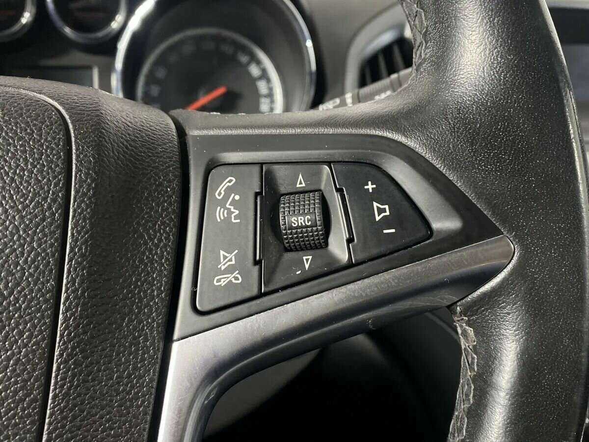 Б/У Опель Астра 2012 года. Фото: #11