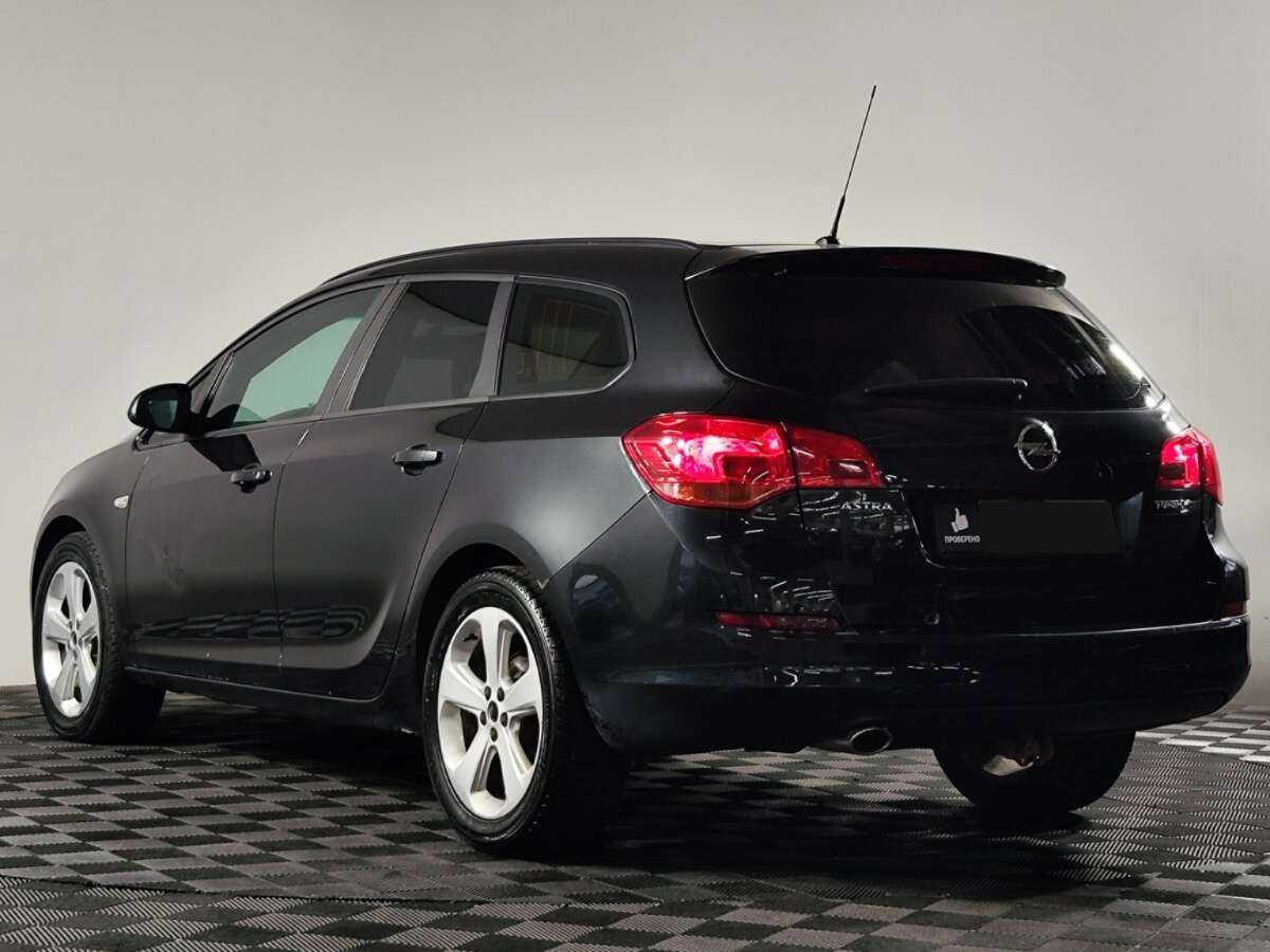Б/У Опель Астра 2012 года. Фото: #4