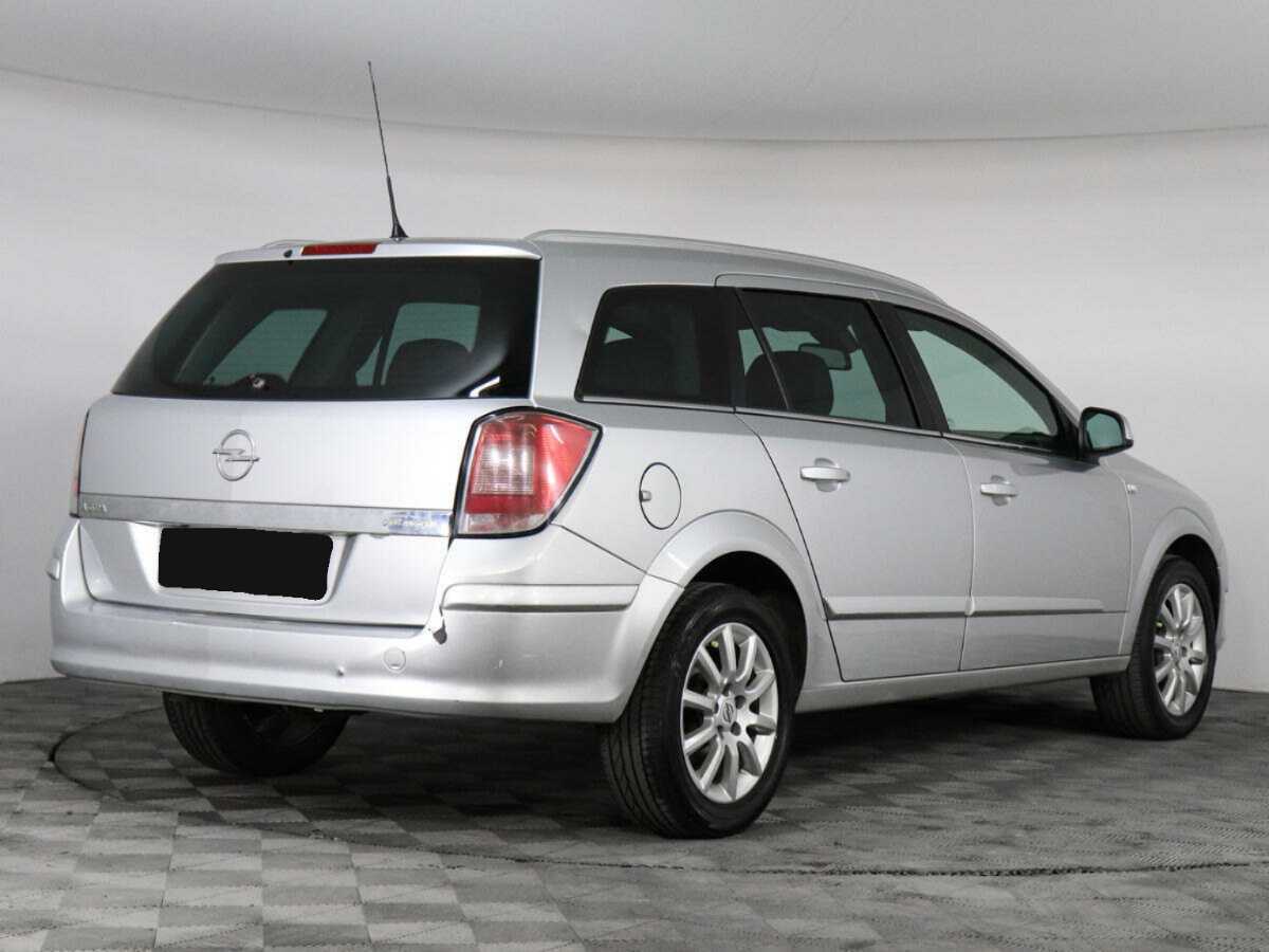 Б/У Опель Астра 2012 года. Фото: #2