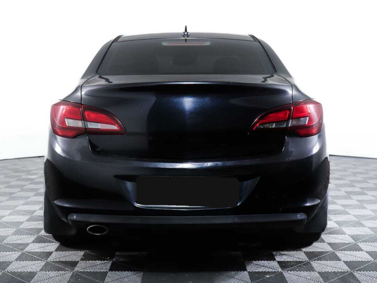 Б/У Опель Астра 2013 года. Фото: #4