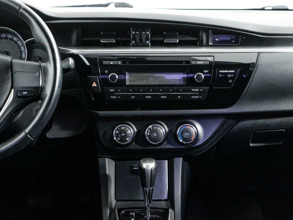 Б/У Тойота Королла 2013 года. Фото: #13