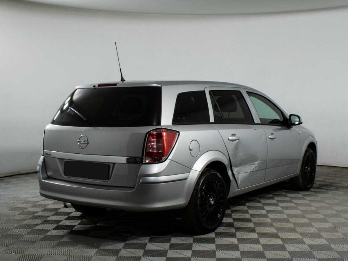 Б/У Опель Астра 2014 года. Фото: #4