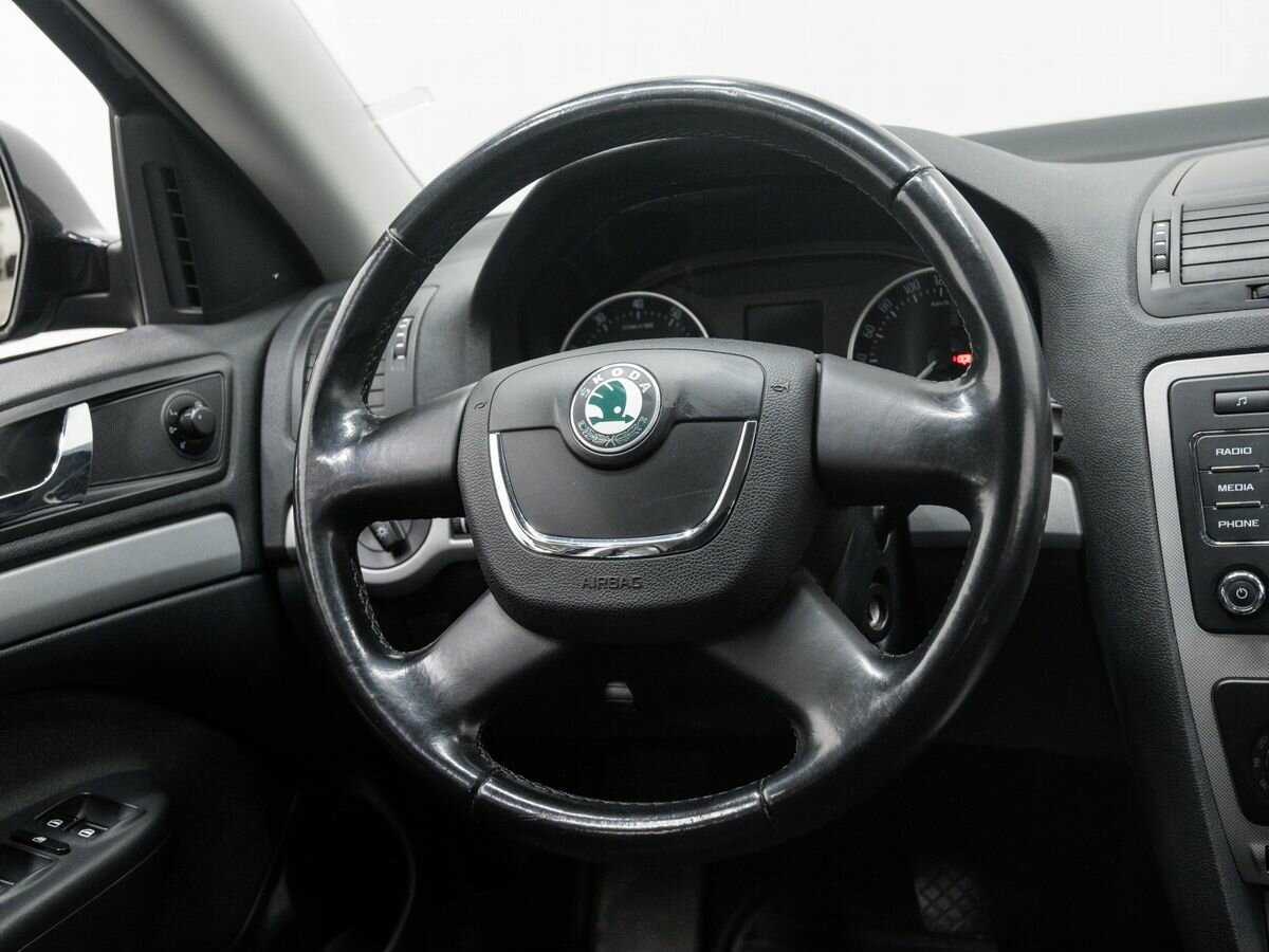 Б/У Шкода Октавия 2012 года. Фото: #9