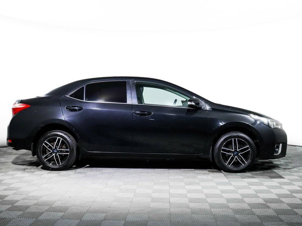 Б/У Тойота Королла 2014 года. Фото: #3