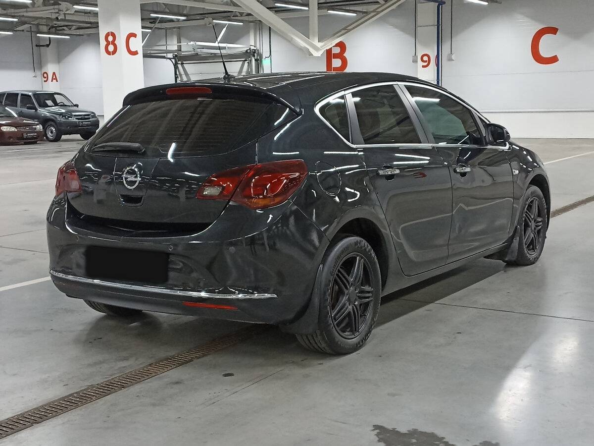 Б/У Опель Астра 2012 года. Фото: #4