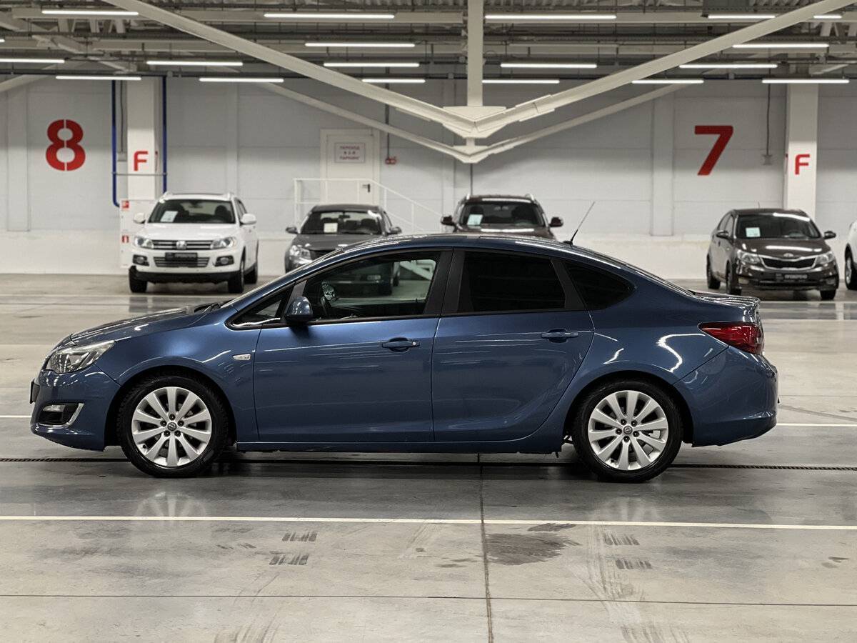 Б/У Опель Астра 2013 года. Фото: #7