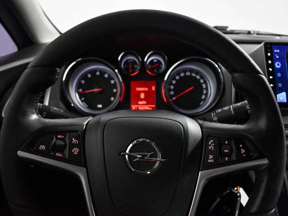 Б/У Опель Астра 2013 года. Фото: #16