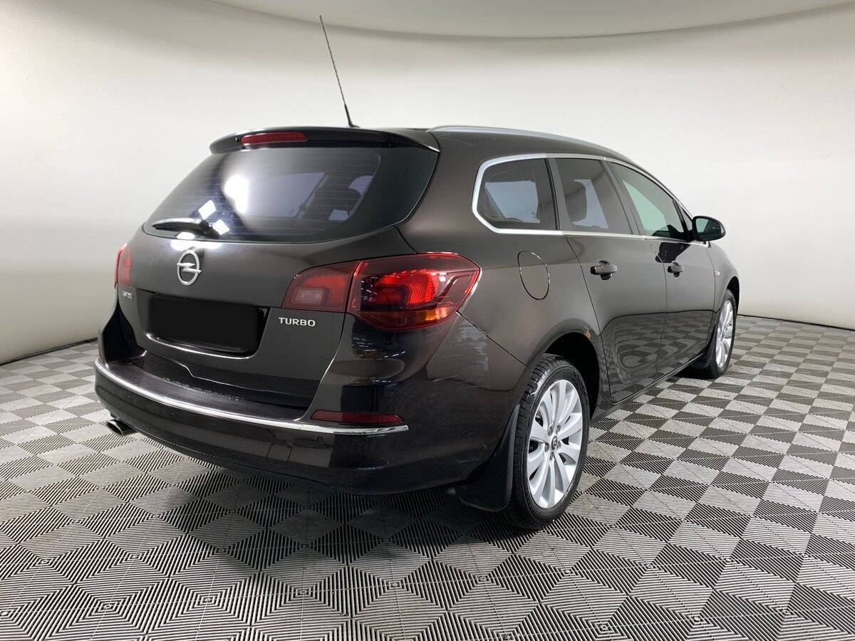 Б/У Опель Астра 2014 года. Фото: #4