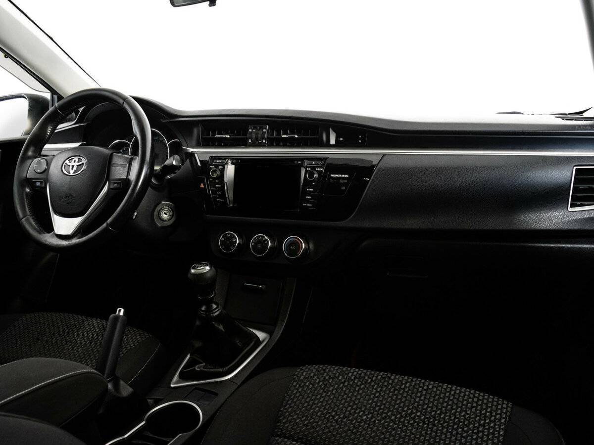 Б/У Тойота Королла 2013 года. Фото: #8