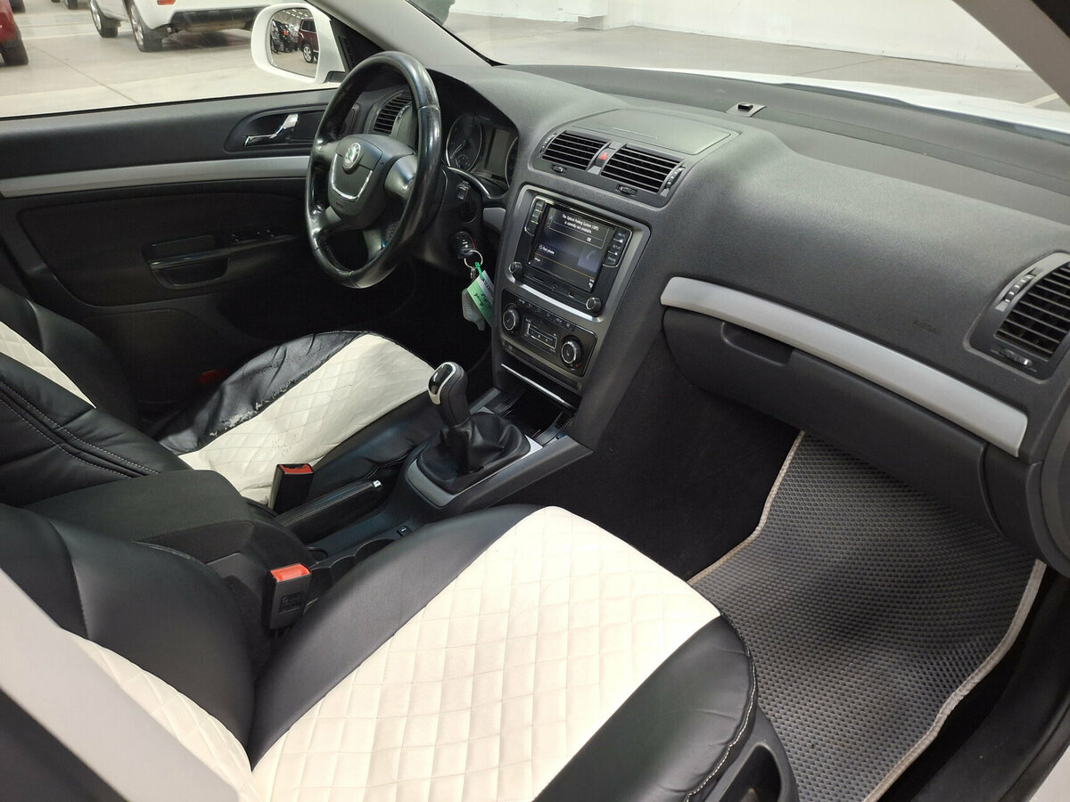 Б/У Шкода Октавия 2012 года. Фото: #10