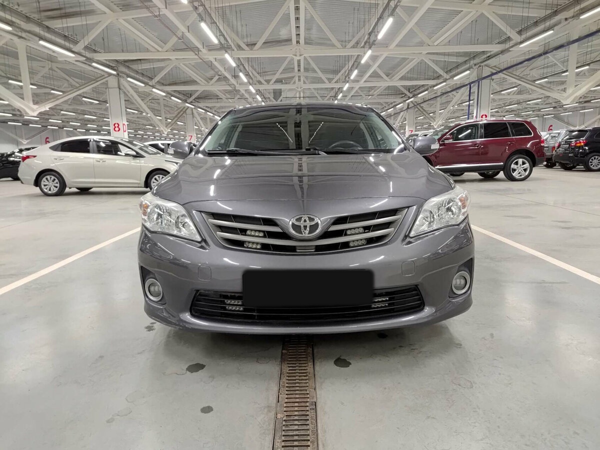 Б/У Тойота Королла 2012 года. Фото: #1