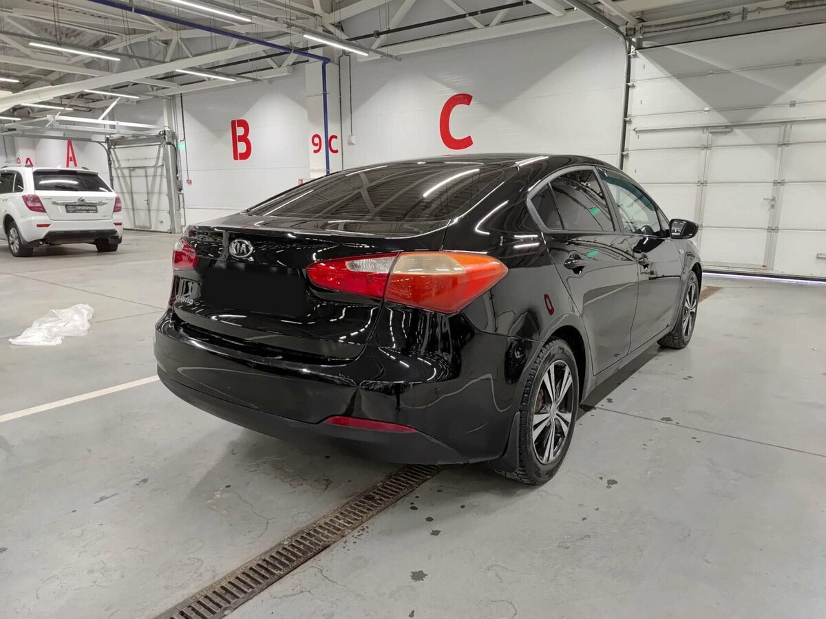 Б/У Киа Церато 2013 года. Фото: #5